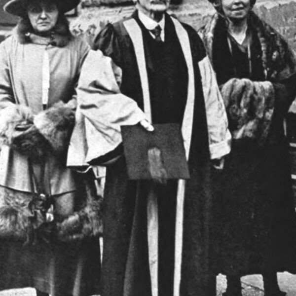 Hardy receiving an honorary degree in Literature at Oxford, Florence on right